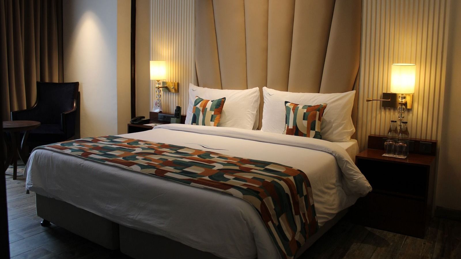 A bedroom featuring a functional working space for productivity at BluSalzz Residence, Amritsar